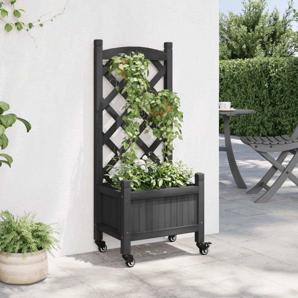 vidaXL Jardinera con enrejado y ruedas madera maciza de abeto negro