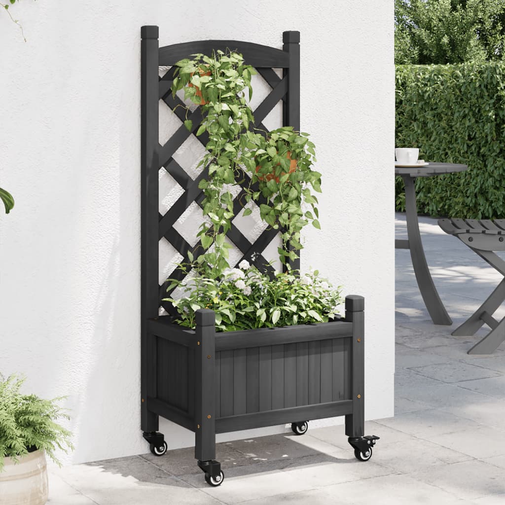 vidaXL Jardinera con enrejado y ruedas madera maciza de abeto negro