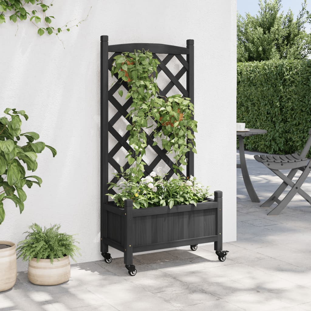 vidaXL Jardinera con enrejado y ruedas madera maciza de abeto negro