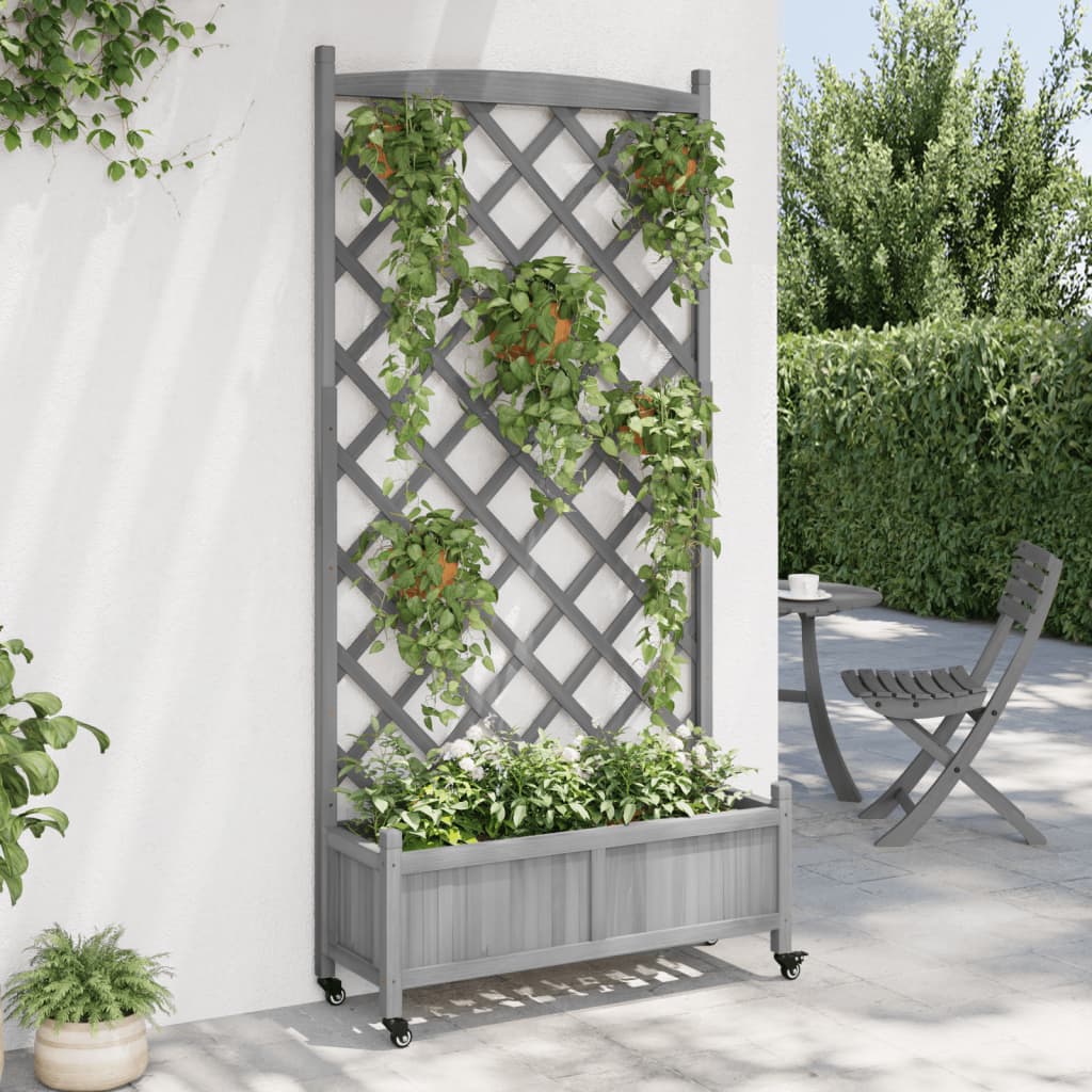 vidaXL Jardinera con enrejado y ruedas madera maciza de abeto gris