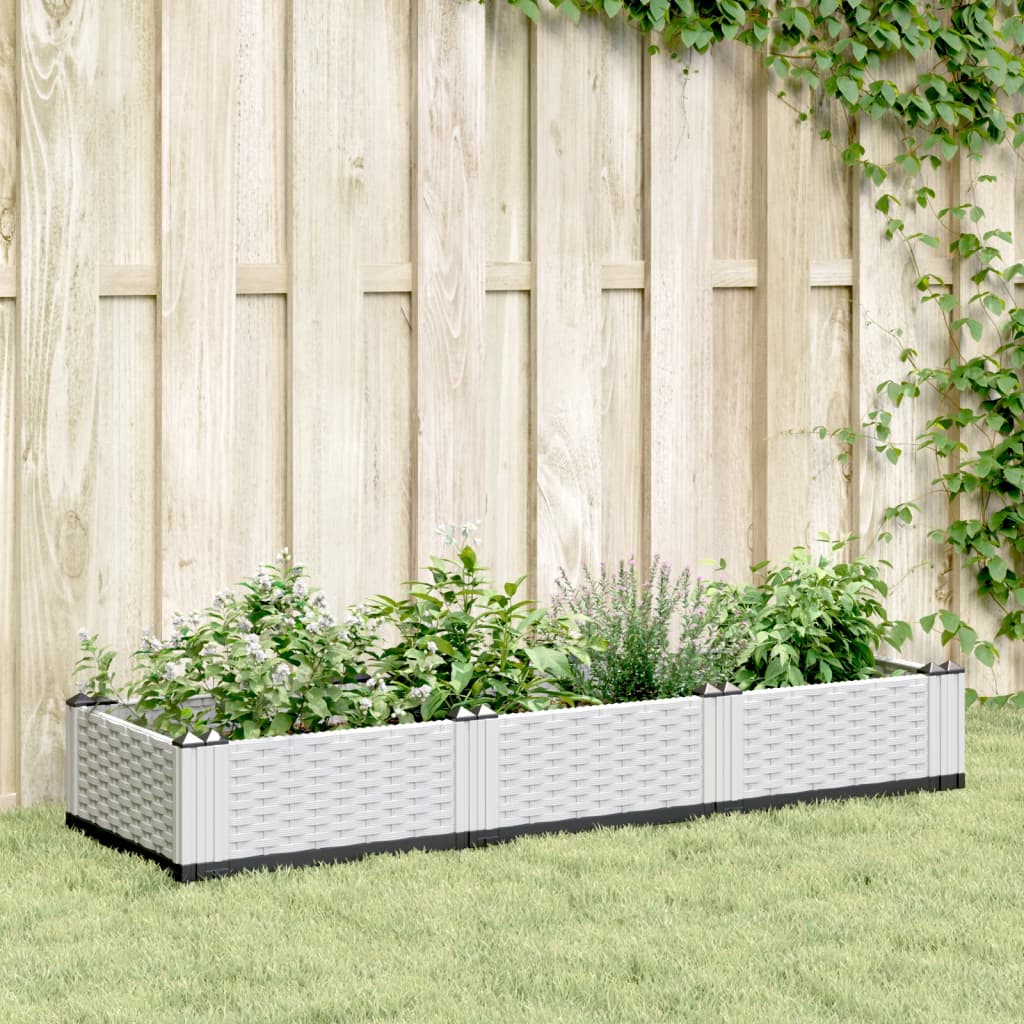 vidaXL Jardinera con clavijas PP blanco 125x40x28,5 cm