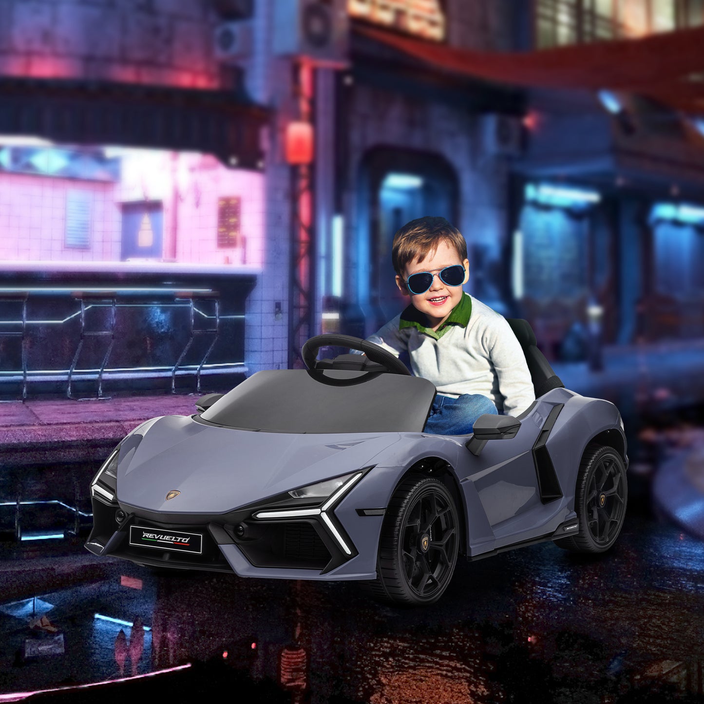 AIYAPLAY Coche Eléctrico para Niños de +3 Años Lamborghini Revuelto Carro Eléctrico Infantil con Batería 12V Mando a Distancia Faros LED Bocina Música y Ruedas Auxiliares Gris