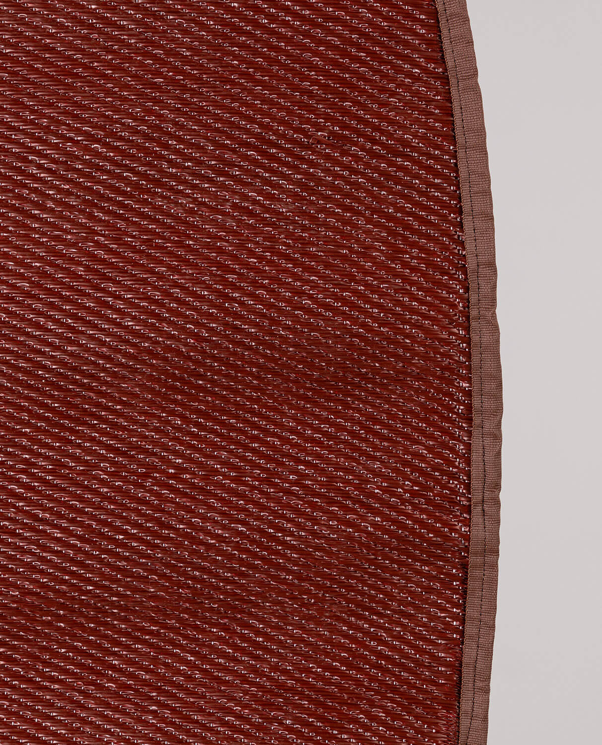 Alfombra de Exterior Redonda de Polipropileno (Ø152 cm) Llevant Rojo Tinto - The Masie