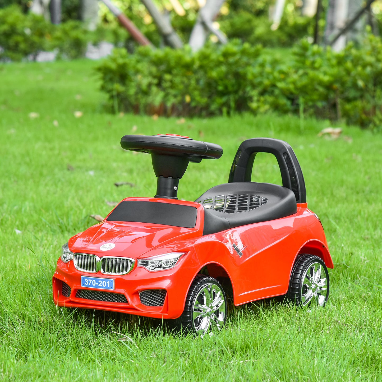 HOMCOM Coche Correpasillos para Niños de 18-36 Meses con Faros Música Bocina Volante Espacio de Almacenaje y Asa para Empujar 63,5x28x36 cm Rojo