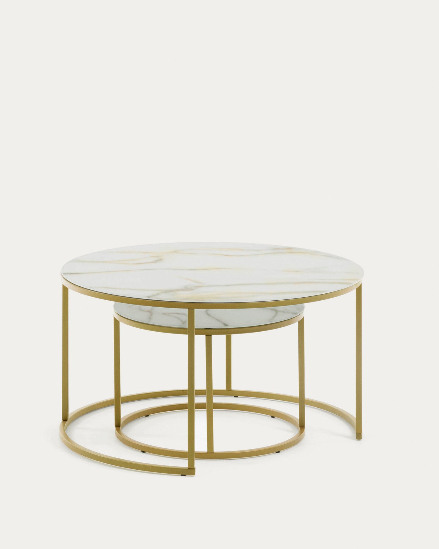 Set Leonor de 2 mesas auxiliares de cristal blanco y acero acabado dorado Ø 80 cm/Ø 50 cm