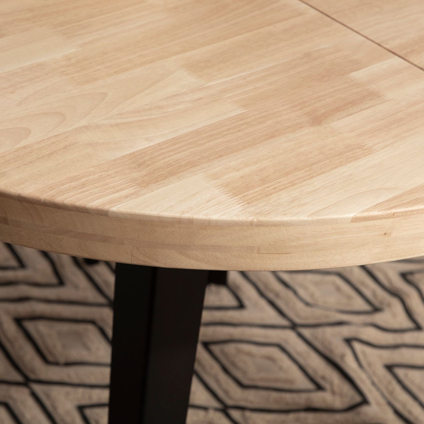 Mesa de comedor redonda extensible 100/180 en madera de roble con pata negra Anais -  Klast