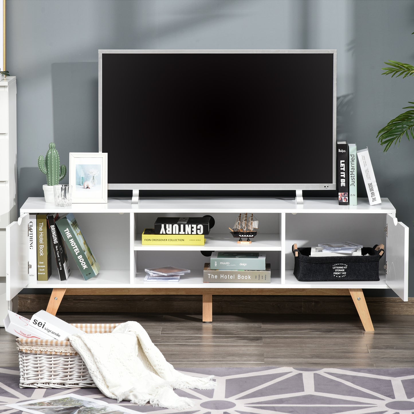 HOMCOM Mueble de TV Moderno Mueble para Televisores de 65 Pulgadas Mesa de TV para Salón con 2 Puertas 2 Estantes Abiertos y Patas de Madera 150x39x50 cm Blanco