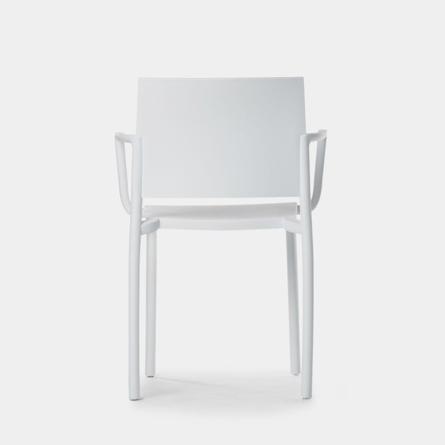 Silla de comedor con reposabrazos en polipropileno blanco Jeven -  Klast