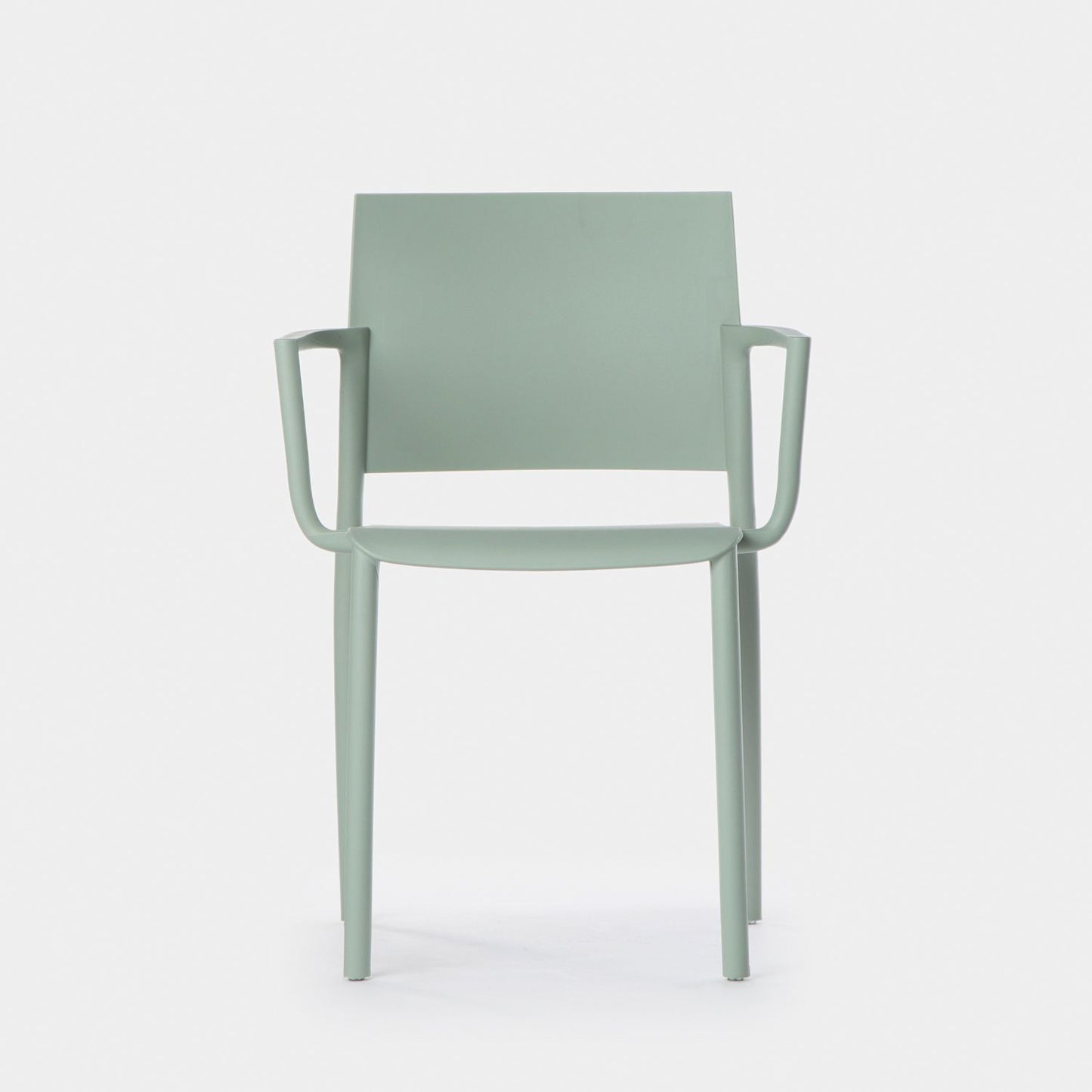 Silla de comedor con reposabrazos en polipropileno verde Jeven -  Klast